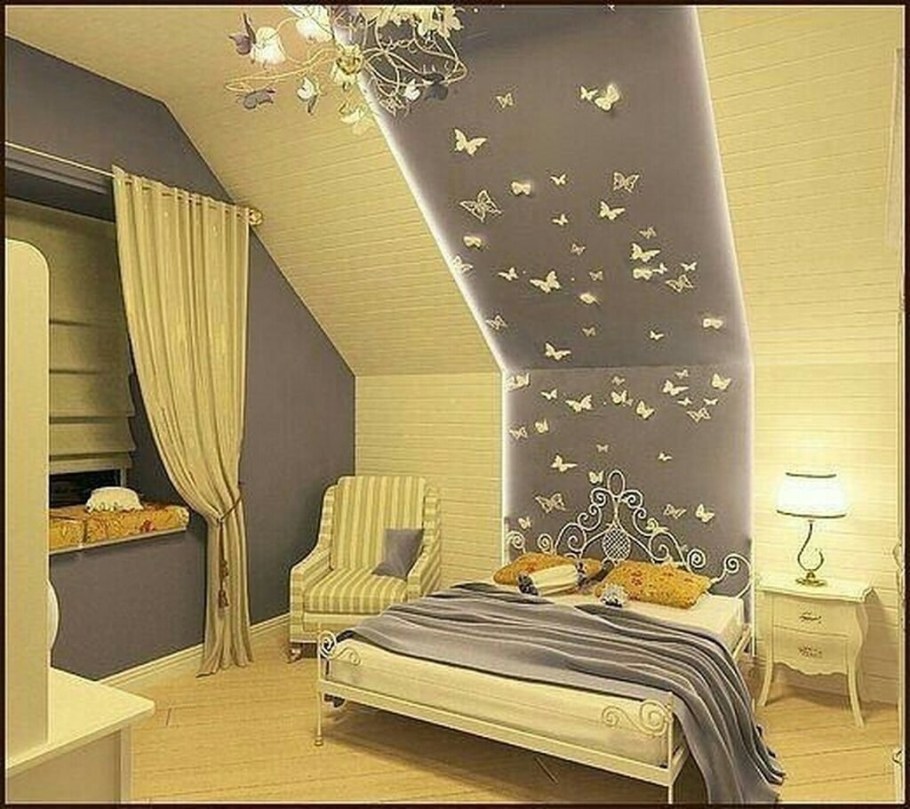 Фотообои в спальне на мансарде