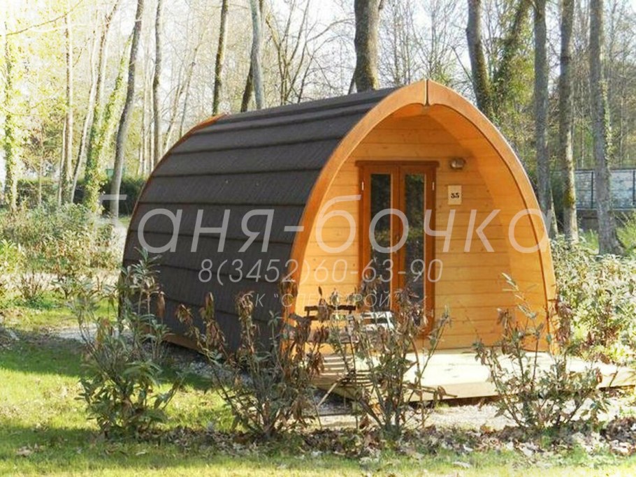 Круглый деревянный домик маленький