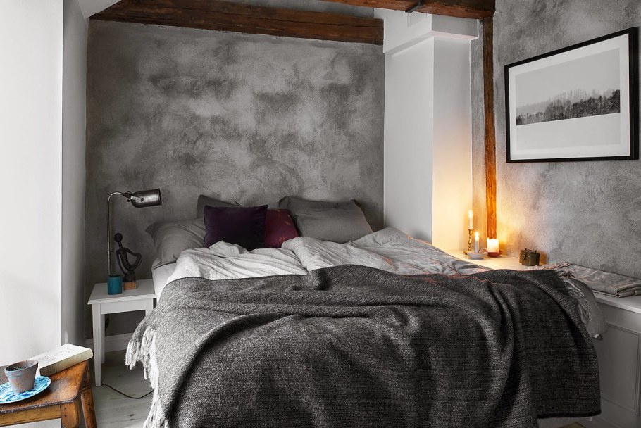 Спальня с бетонными стенами