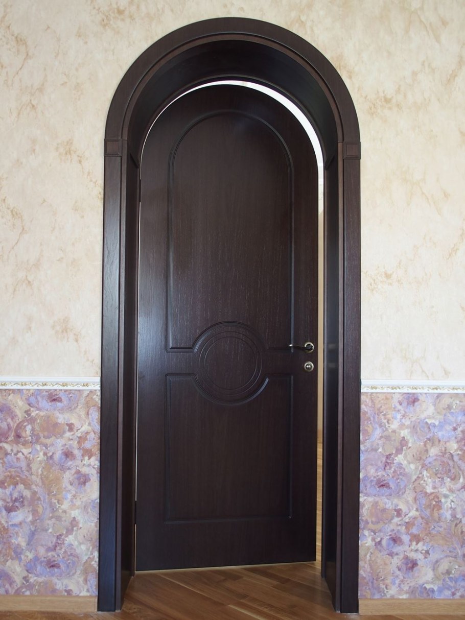 Арочная металлическая дверь