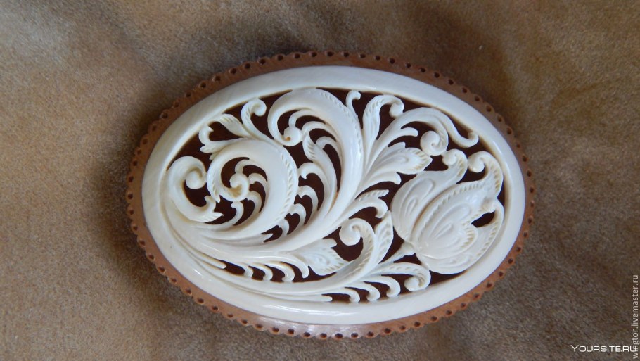 Холмогорская резьба по кости гребни