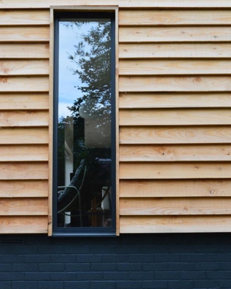 Отделка фасада доской