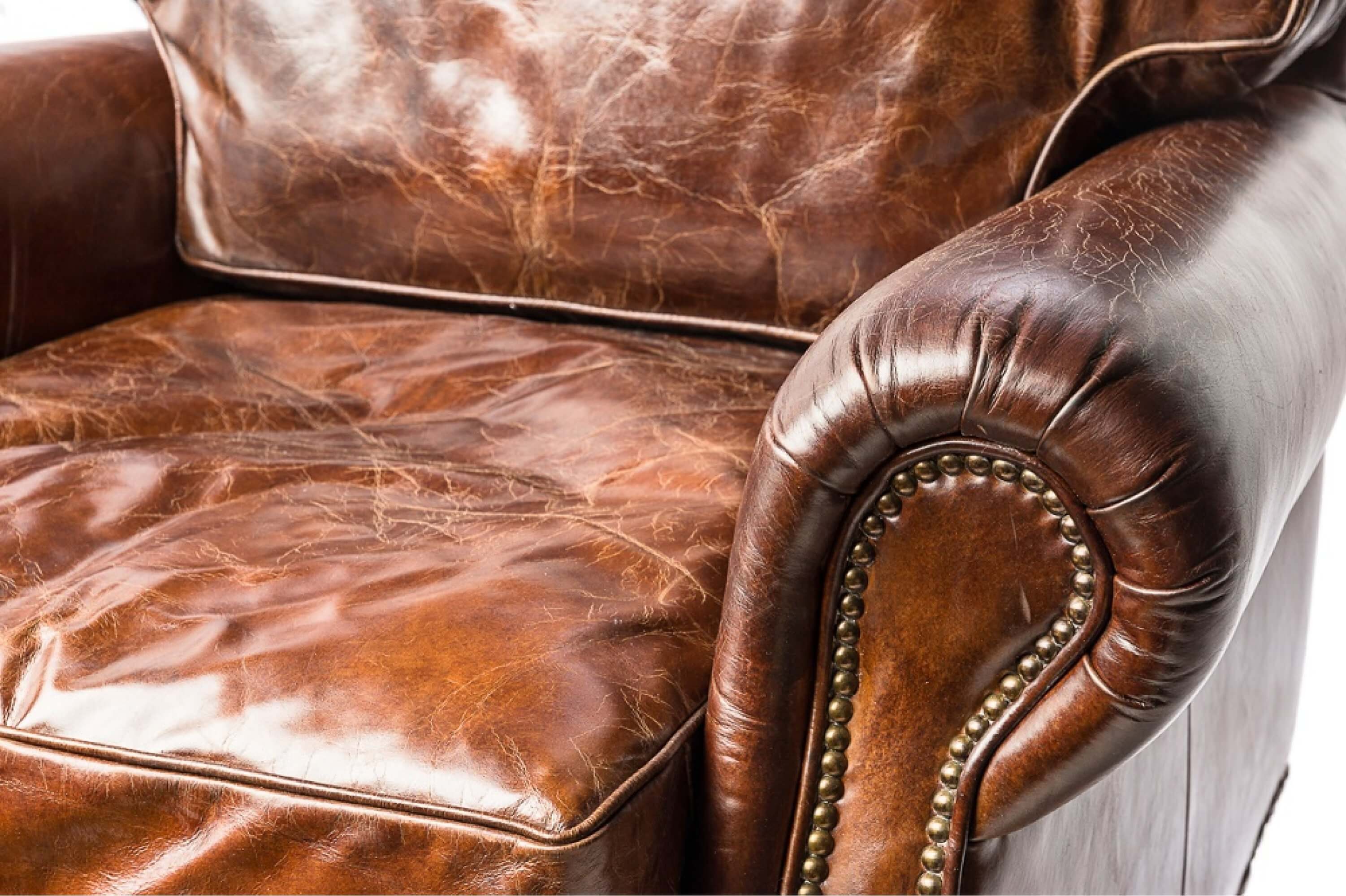 Обивка стула кожей. Кожаная мебель. Кожаный диван. Кресло из натуральной кожи. Кресло кожаное коричневое.