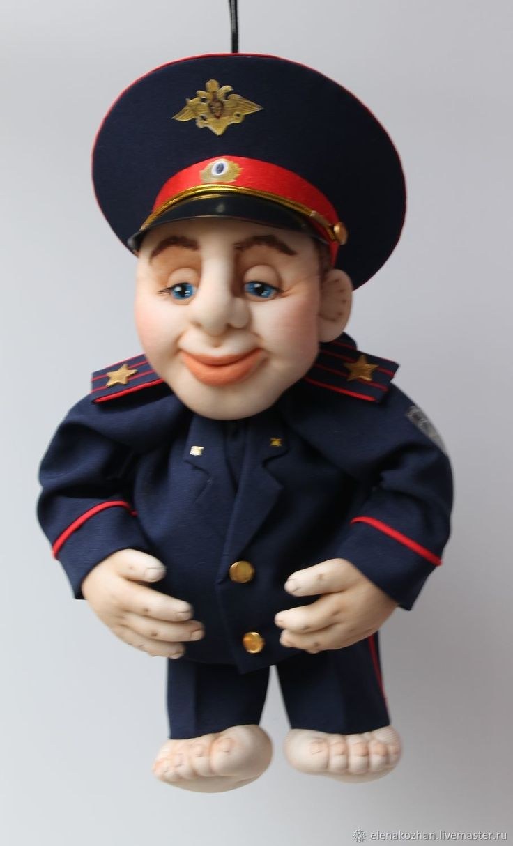 Игрушка милиционер