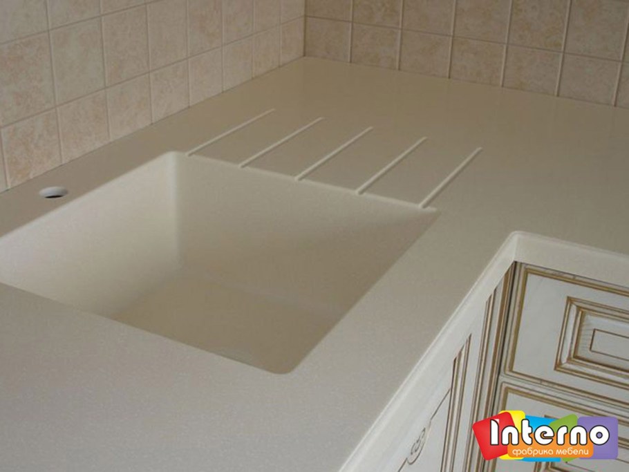 Мойка интегрированная в столешницу из искусственного камня