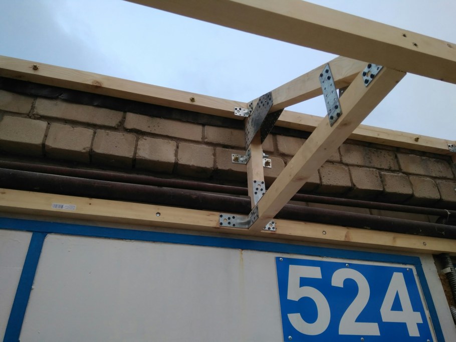 Козырек над воротами гаража