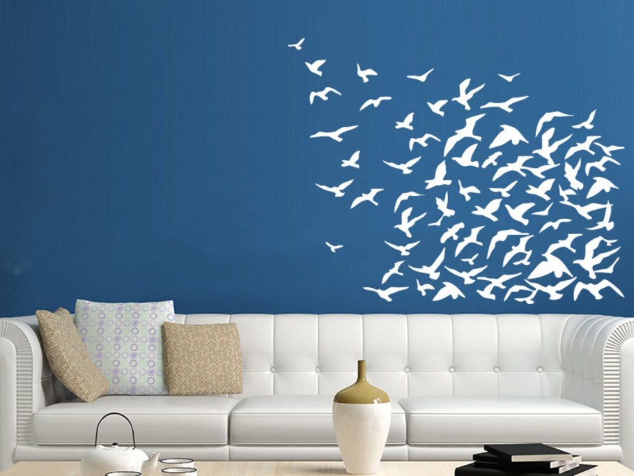 Птички на стене в интерьере