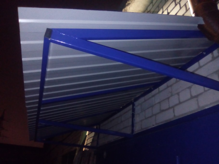 Навес на ворота гаража