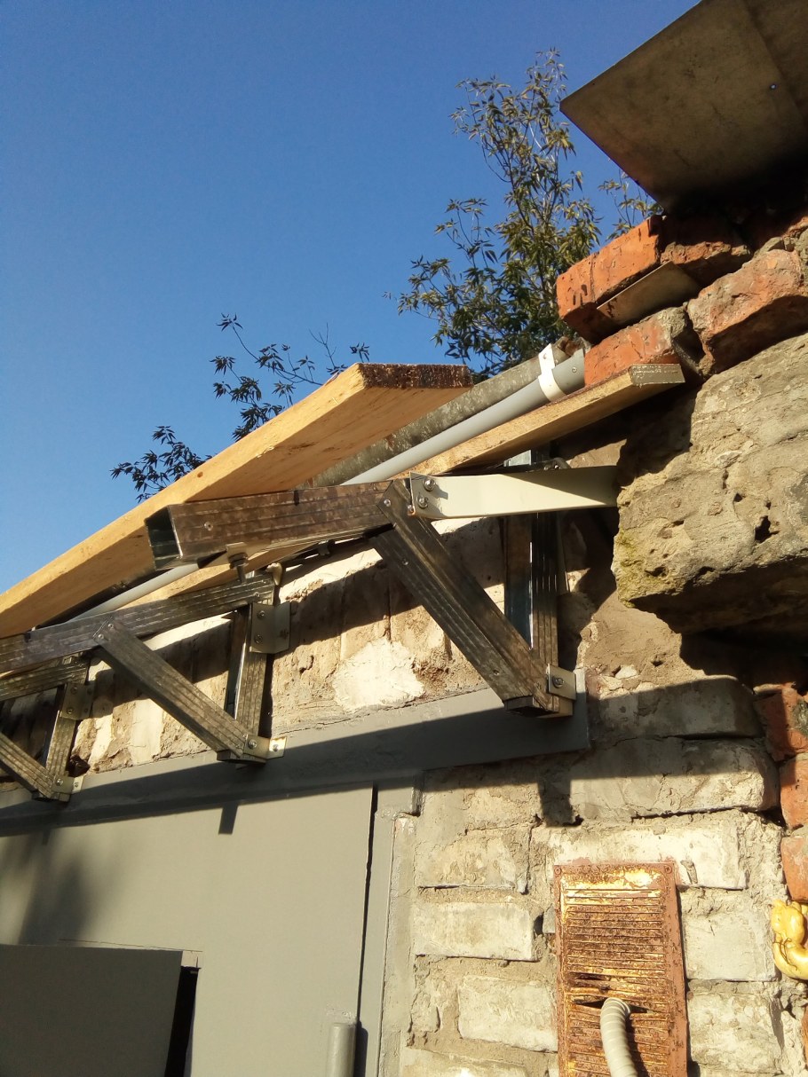 Навес над воротами гаража