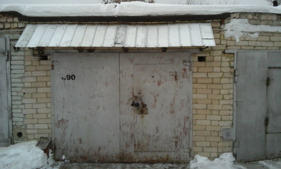 Козырек на ворота гаража