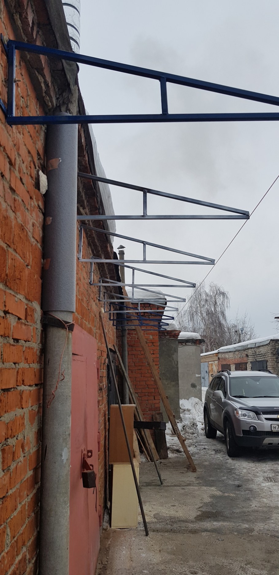 Козырек над гаражными воротами