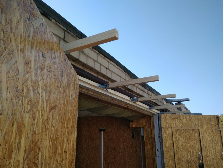 Навес над воротами гаража