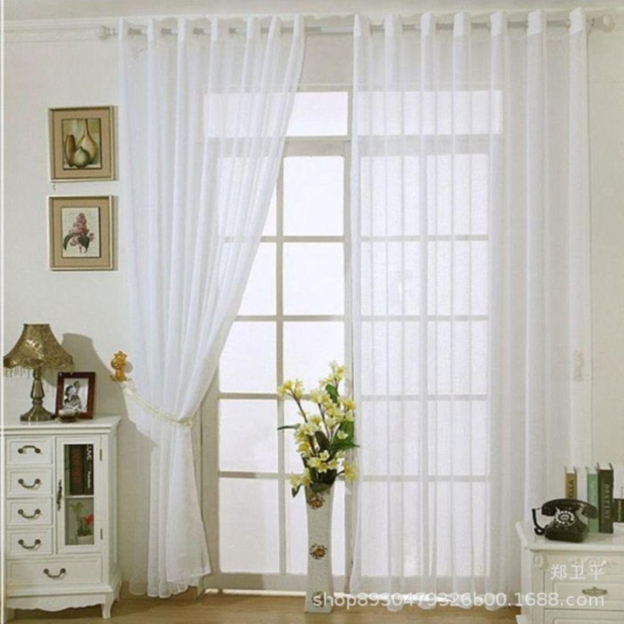 Занавески тюлевые на окнах