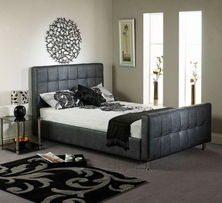 Спальня с серой кроватью