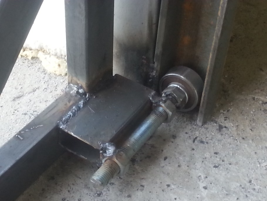 Пружинный амортизатор для откатных ворот