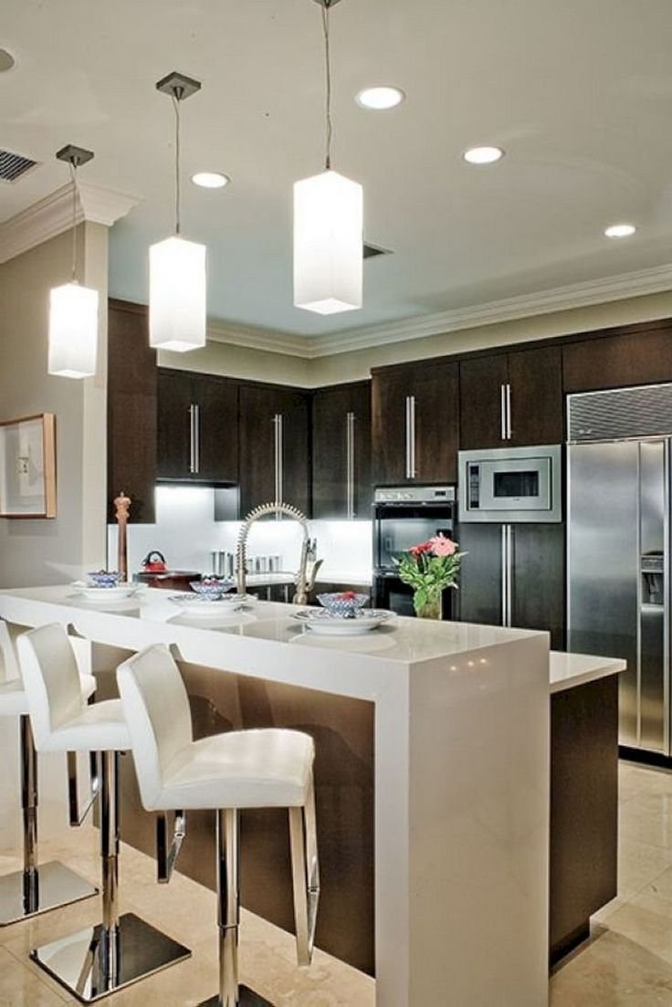 Светильник над барной стойкой на кухне