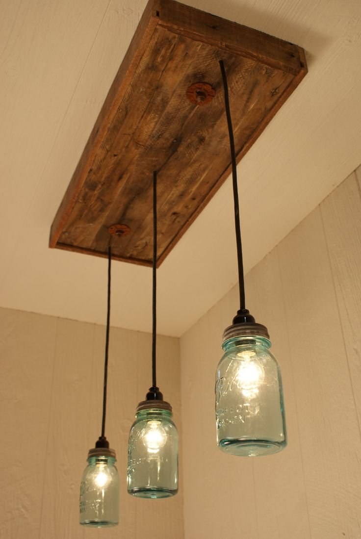 Люстры и светильники из дерева