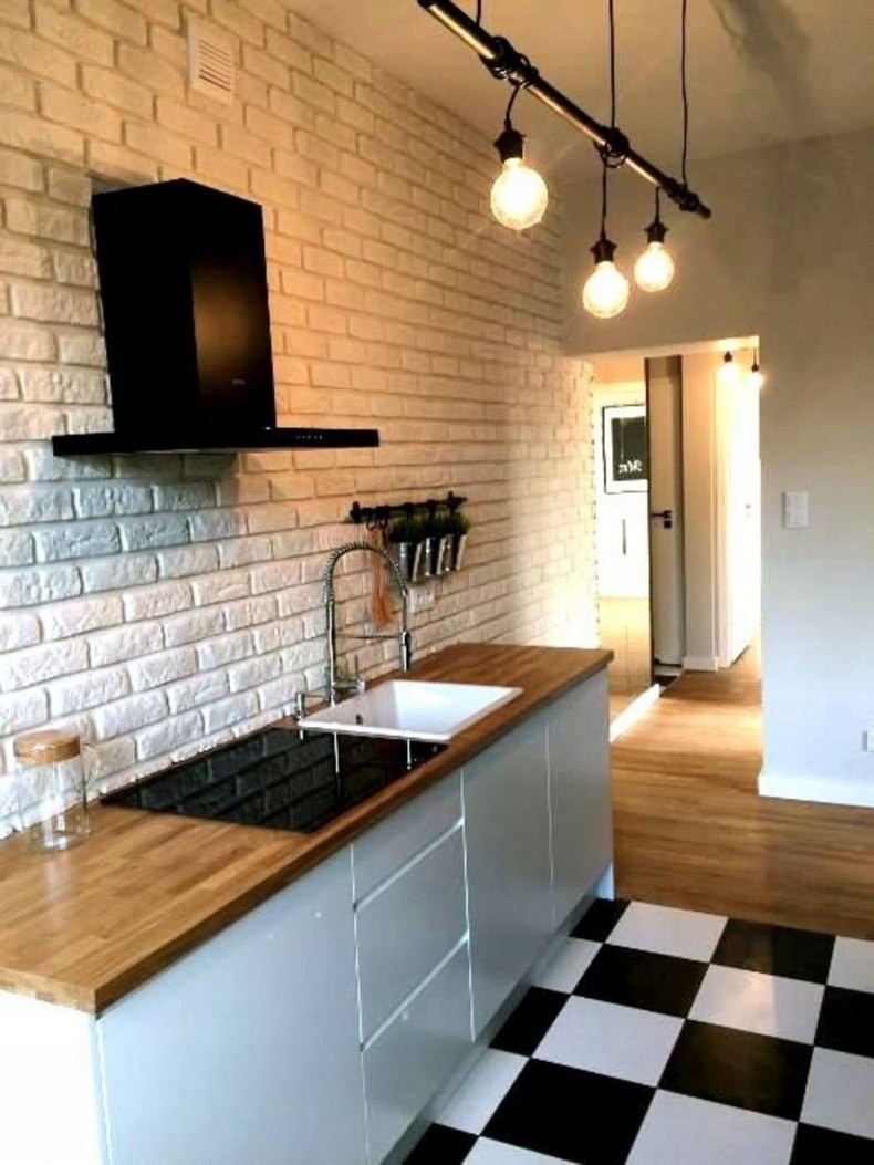 Отделка стен под кирпич на кухне