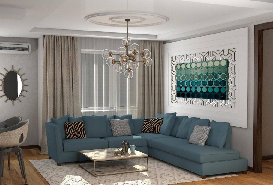 Бирюзовый диван в интерьере гостиной