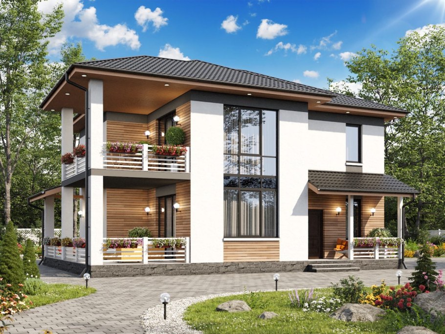 Двухэтажный дом с террасой и балконом