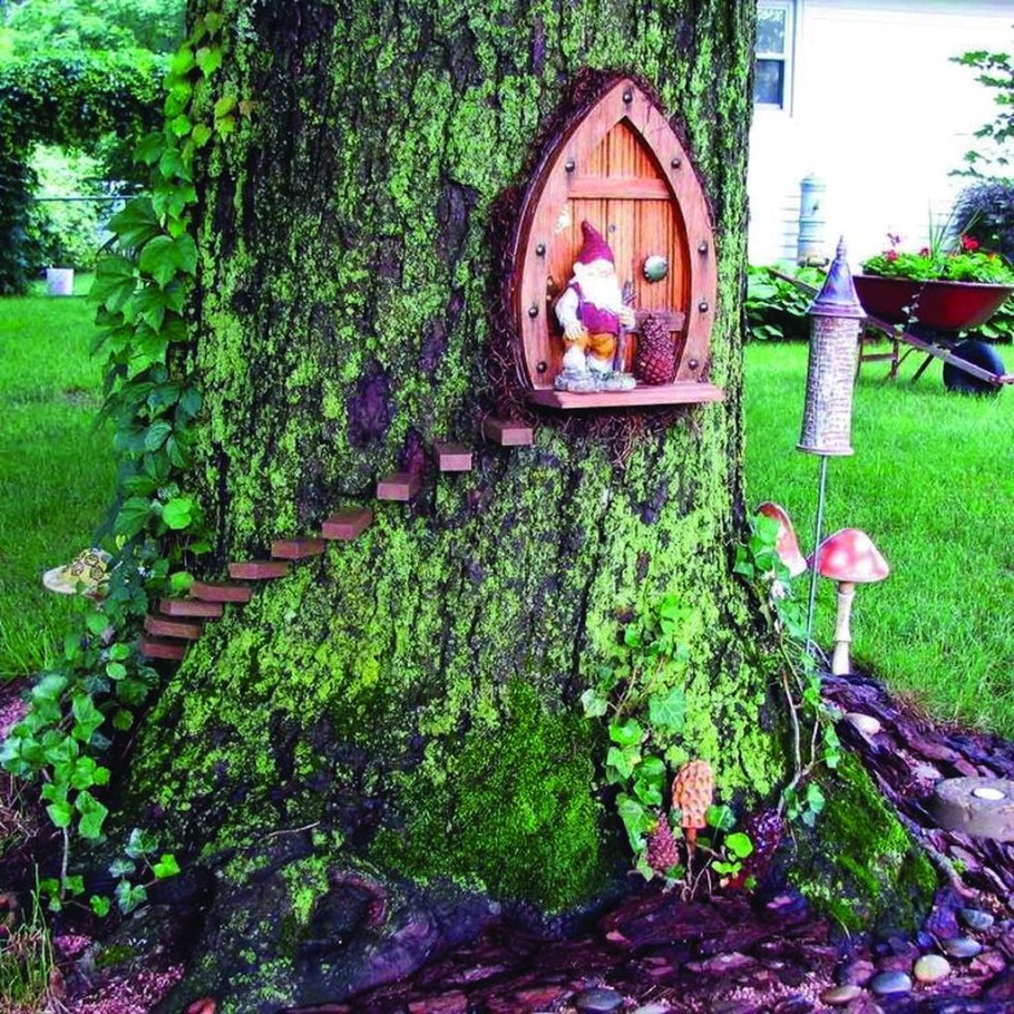 Декор спиленного дерева на даче