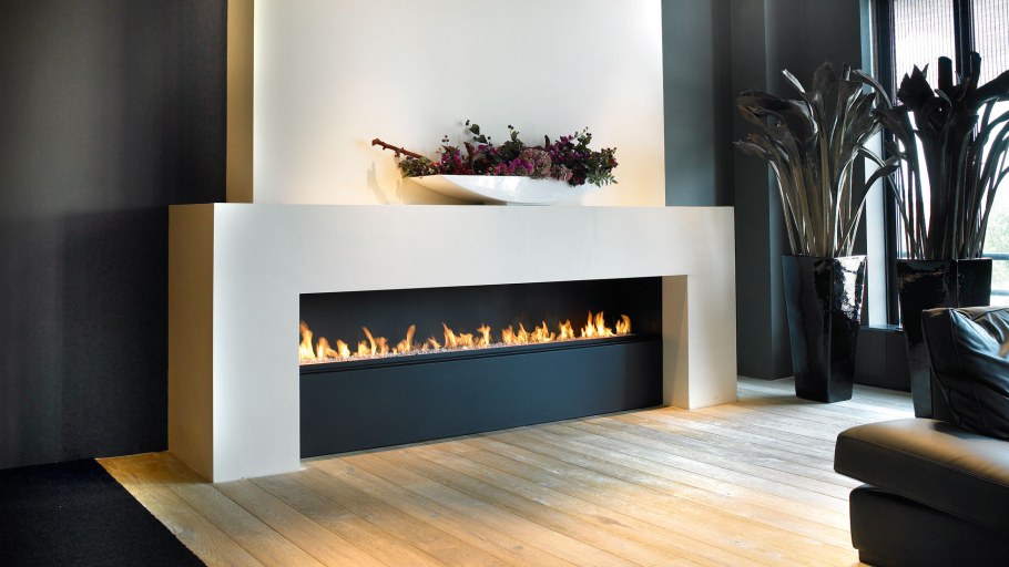 Настенный биокамин в интерьере гостиной