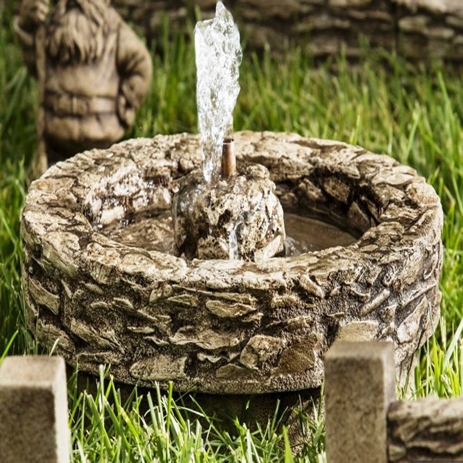 Каменный фонтан для сада