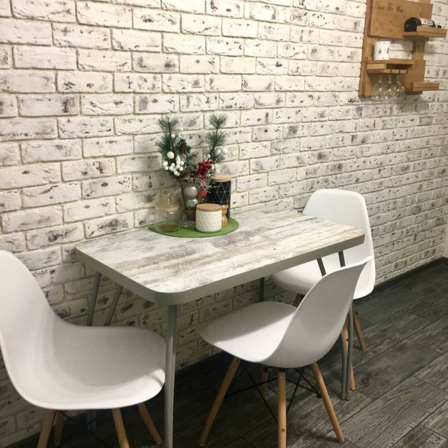 Кирпичная стена в интерьере кухни