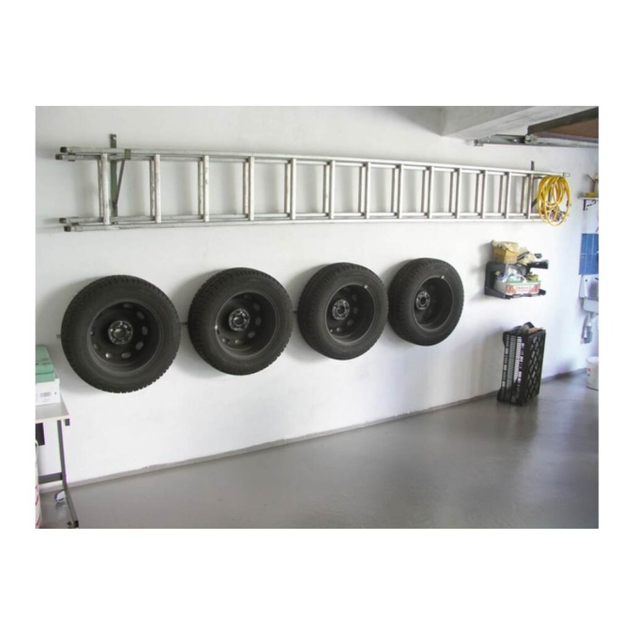 Кронштейны для хранения колес в гараже на стене
