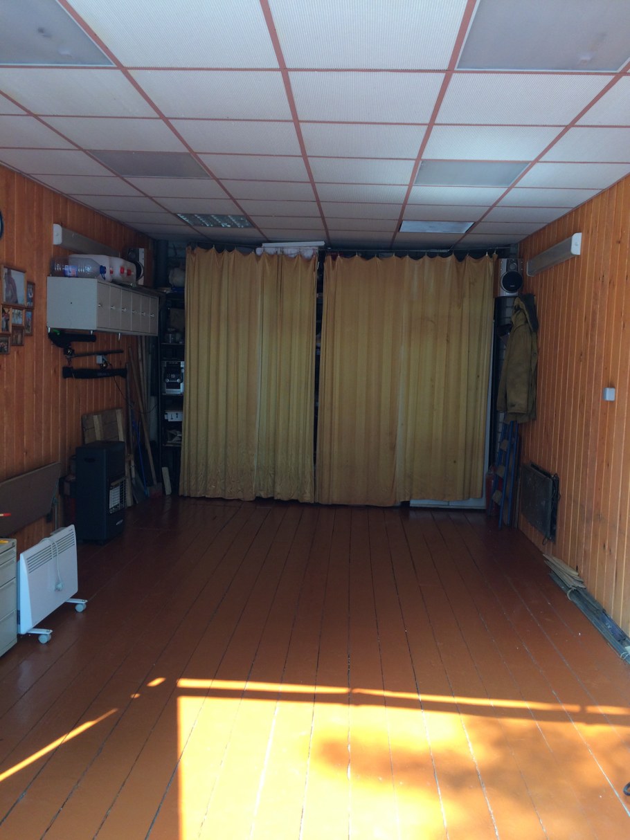 Отделка гаража ДВП