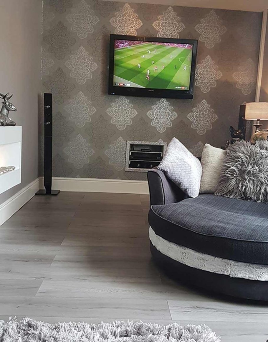 Серый ламинат в интерьере гостиной