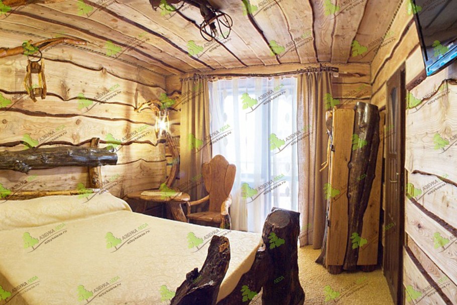 Отделка дома из необрезной доски