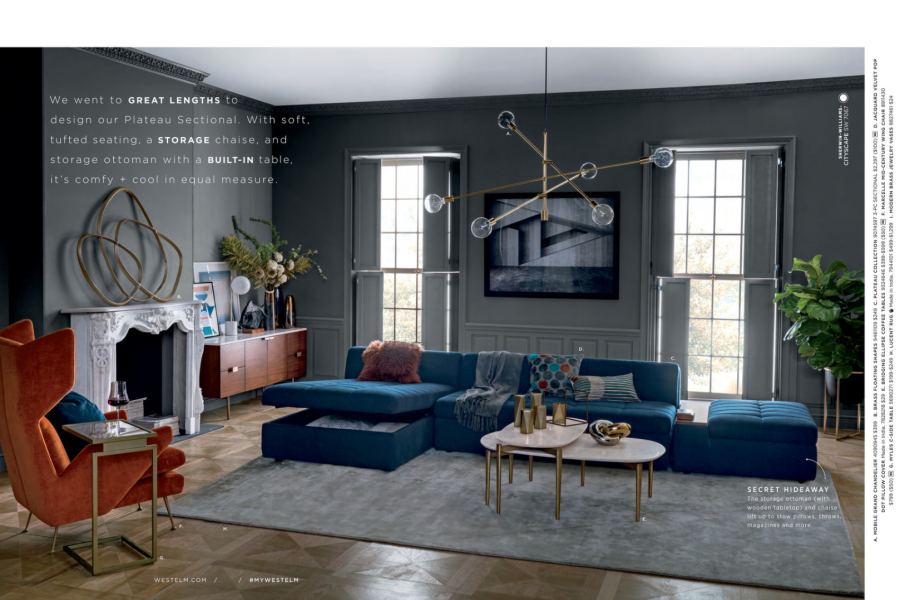 Серые стены голубой диван