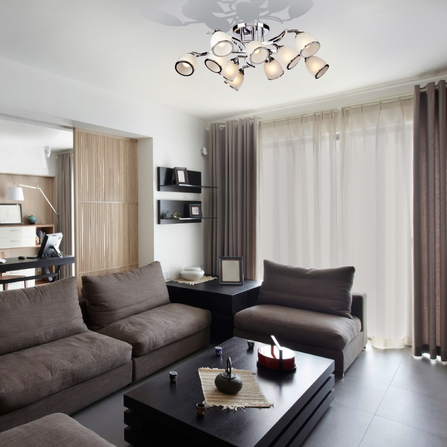 Люстры в интерьере гостиной современная