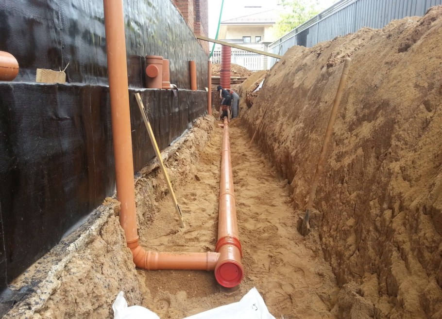 Канализация под фундаментом