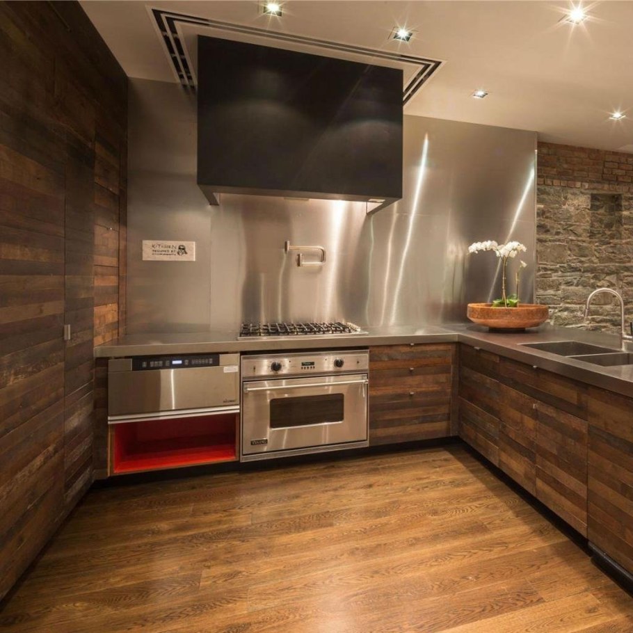 Ламинат на стене в интерьере кухни