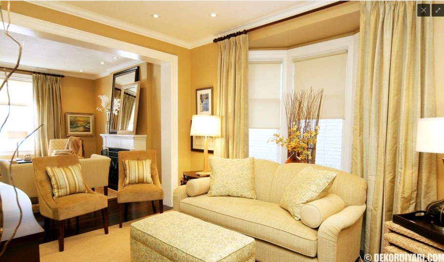Желтые шторы в интерьере гостиной