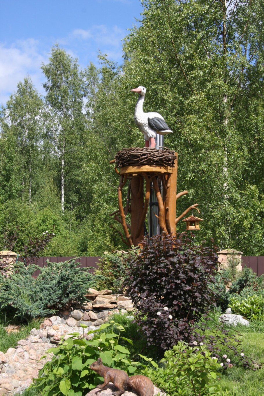 Аисты в саду декор для сада