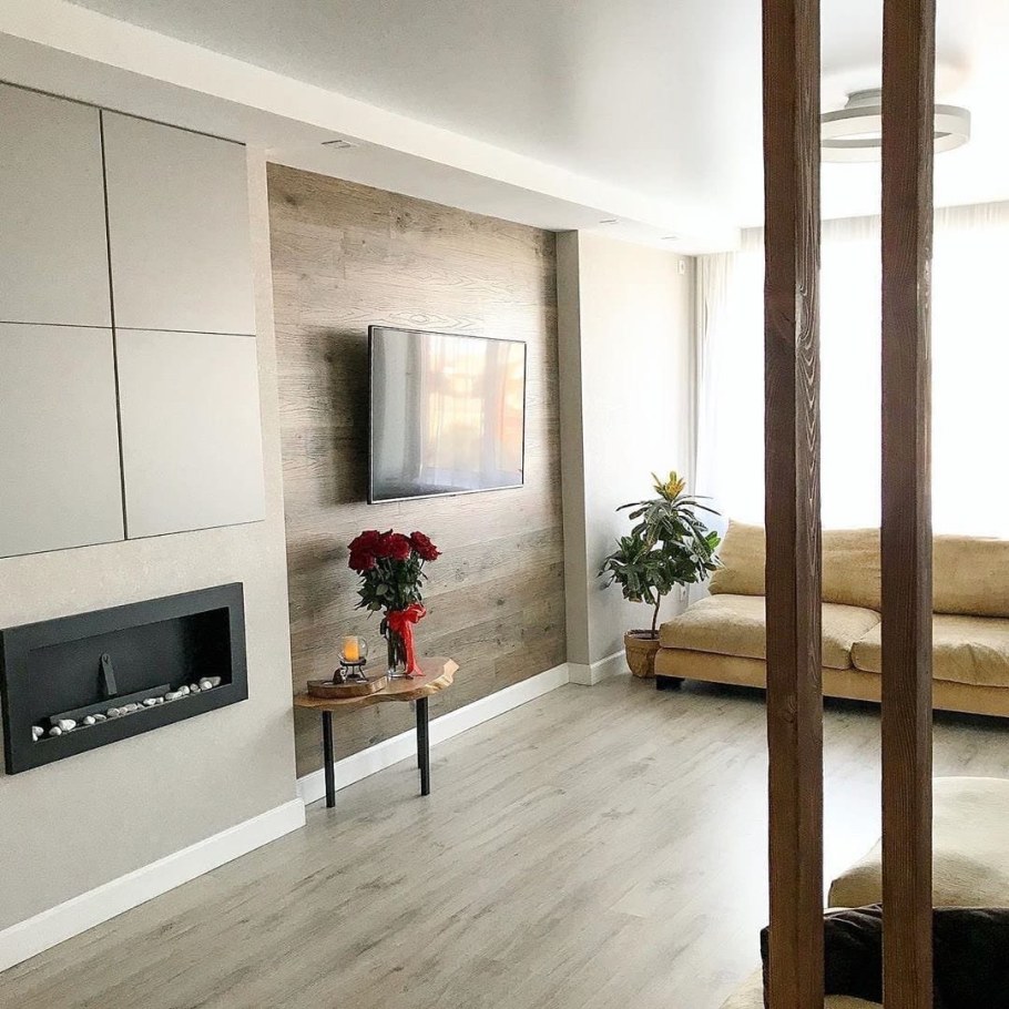 Ламинат на стене в интерьере гостиной