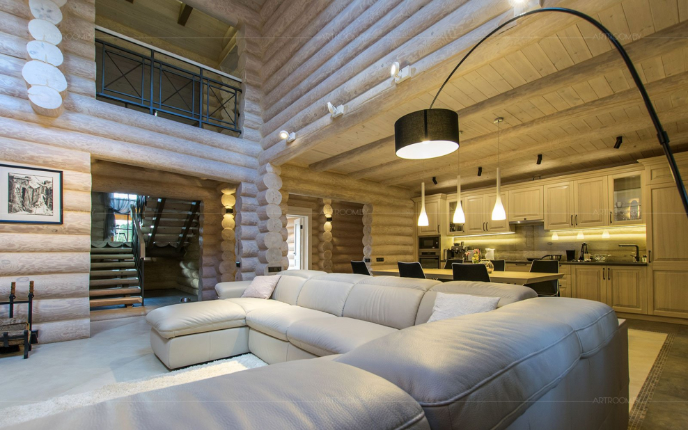 Спальня в доме из бревна