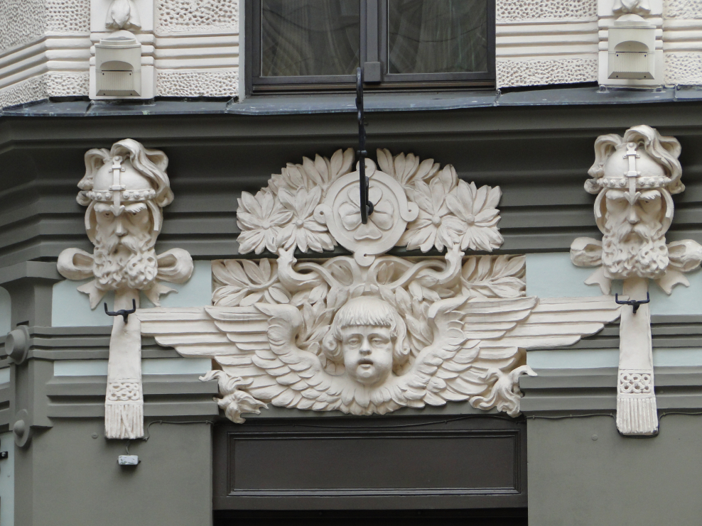 Маскароны Петербурга барельефы