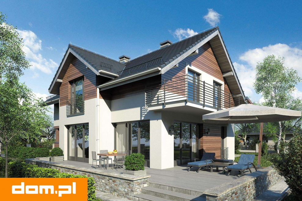 Дом с мансардой и террасой и балконом и гаражом