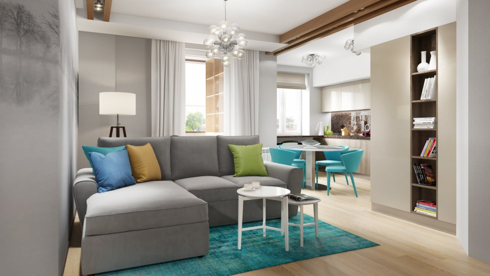 Бирюзовый диван в светлой гостиной