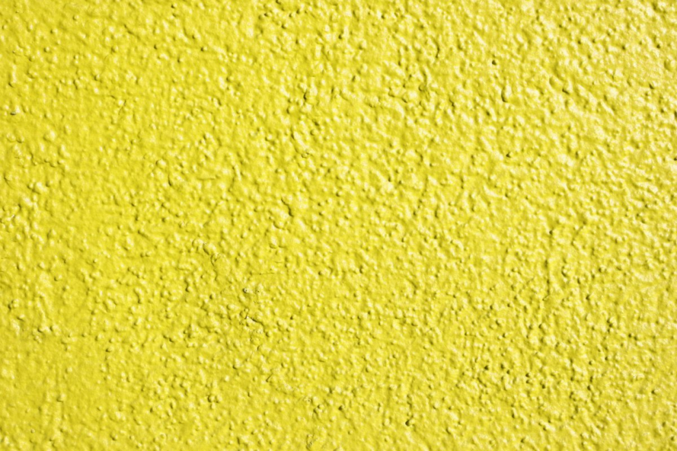 Желтая штукатурка текстура