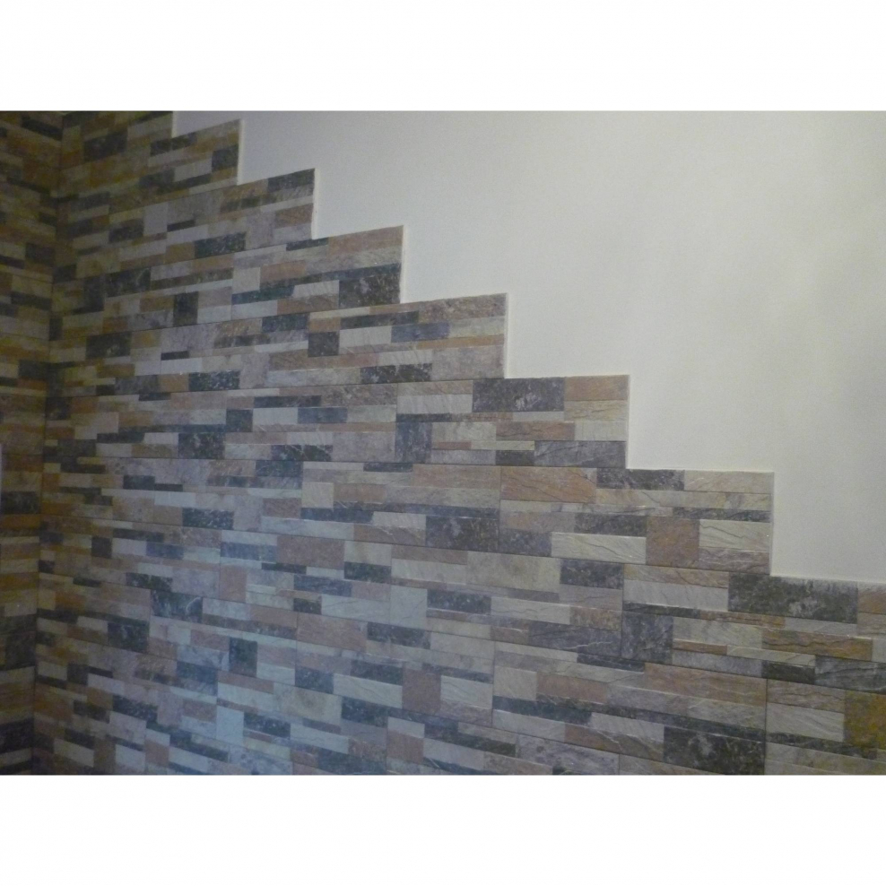 Кладка плитки на стену лесенкой