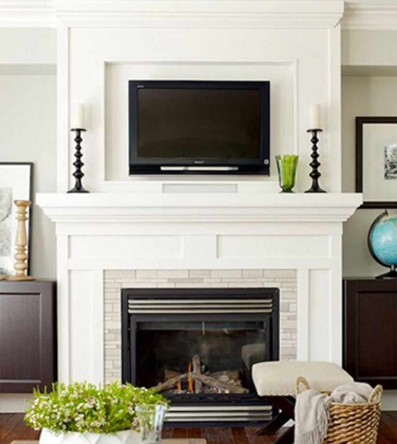 Искусственный камин в интерьере гостиной