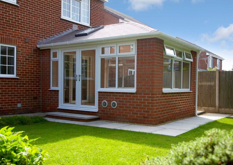 Пристройка к кирпичному дому