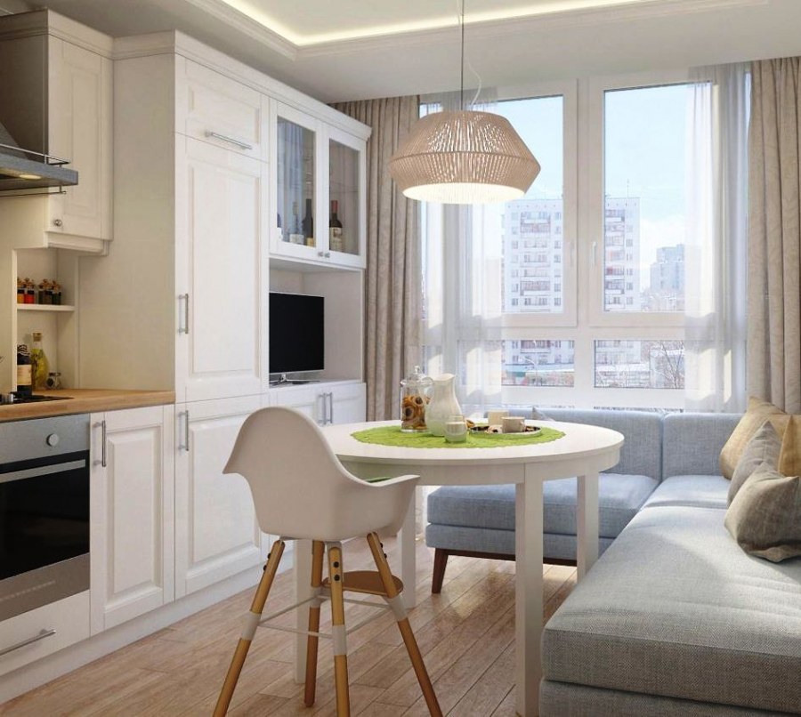 Гостиная с обеденным столом у окна