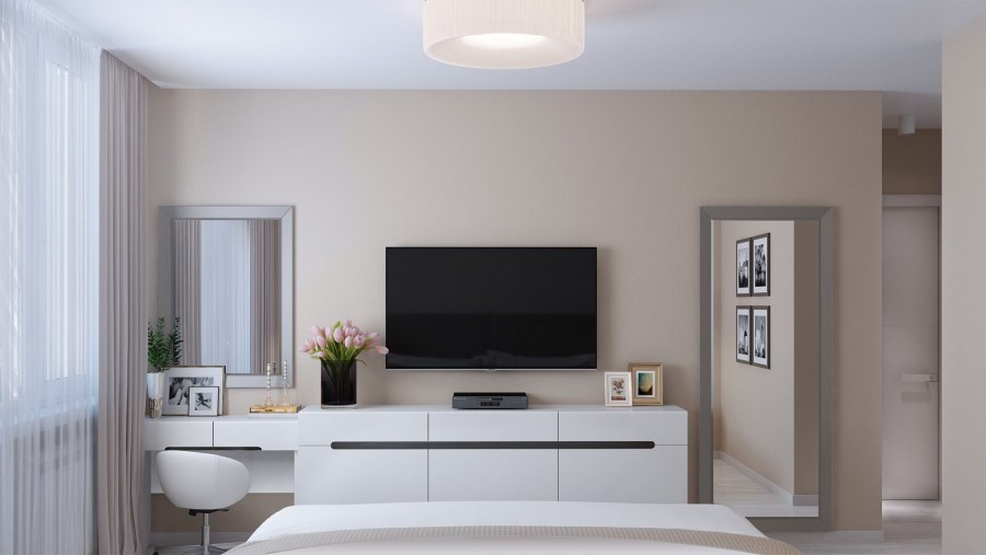Интерьер спальни с телевизором