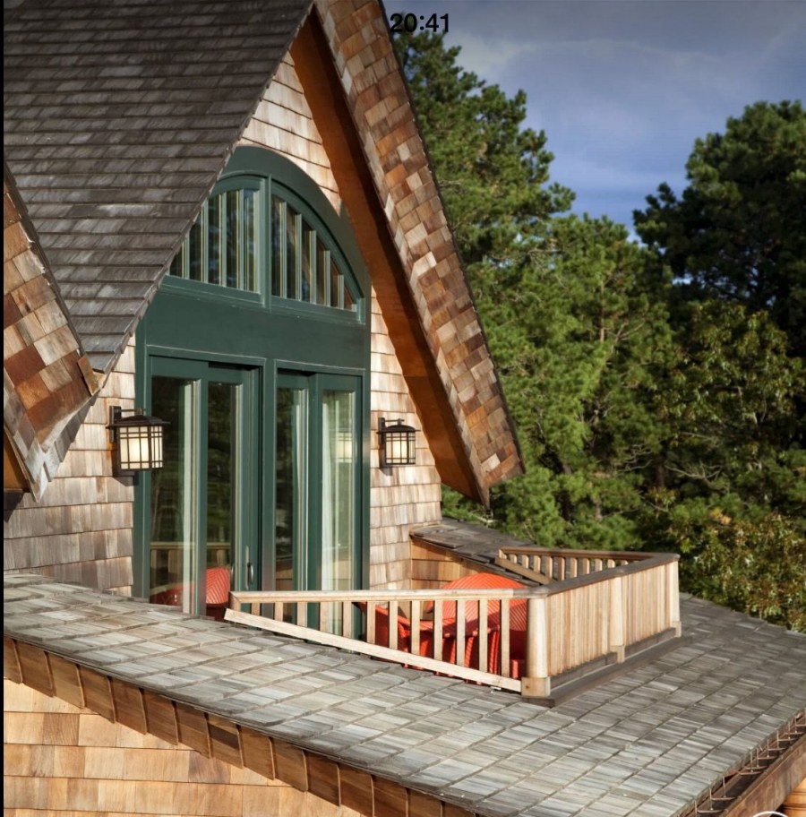 Фасад дома с мансардным этажом